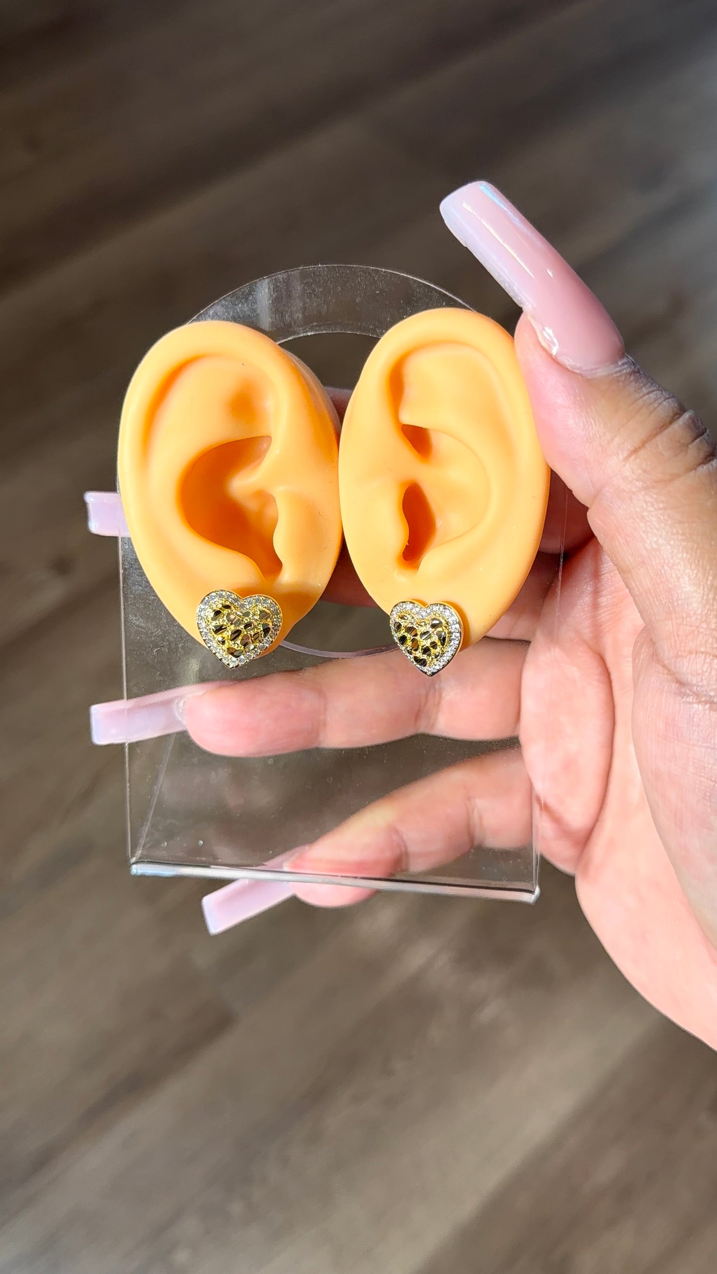 Diamond lined heart stud earrings