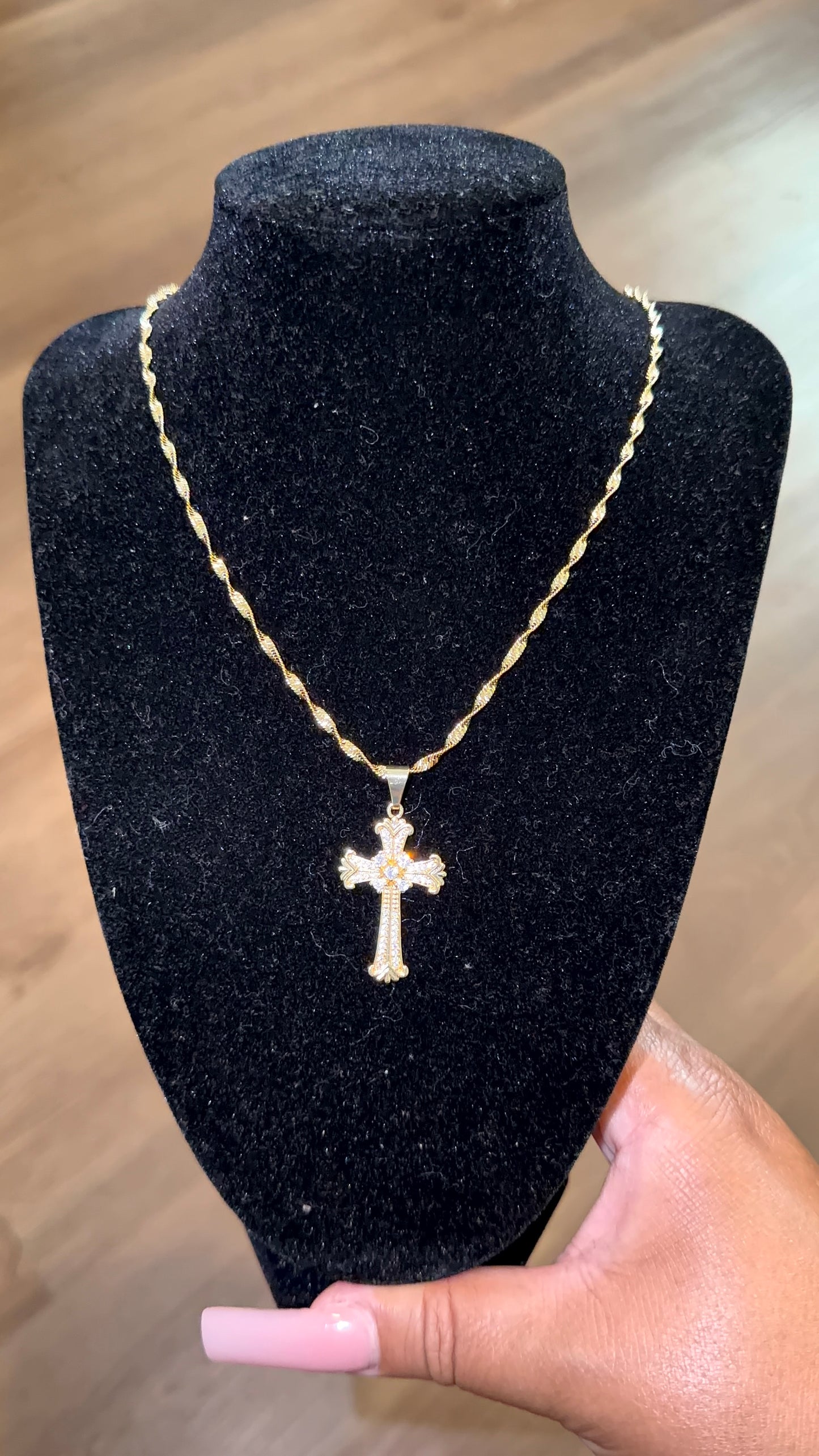 Gold cross middle diamond necklace